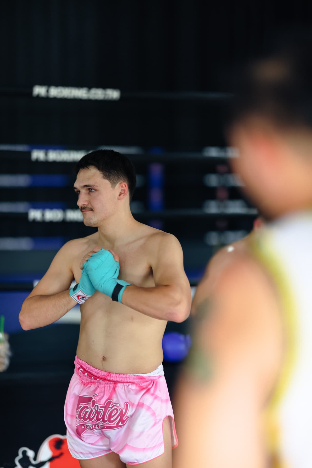 A fighter performing the wai